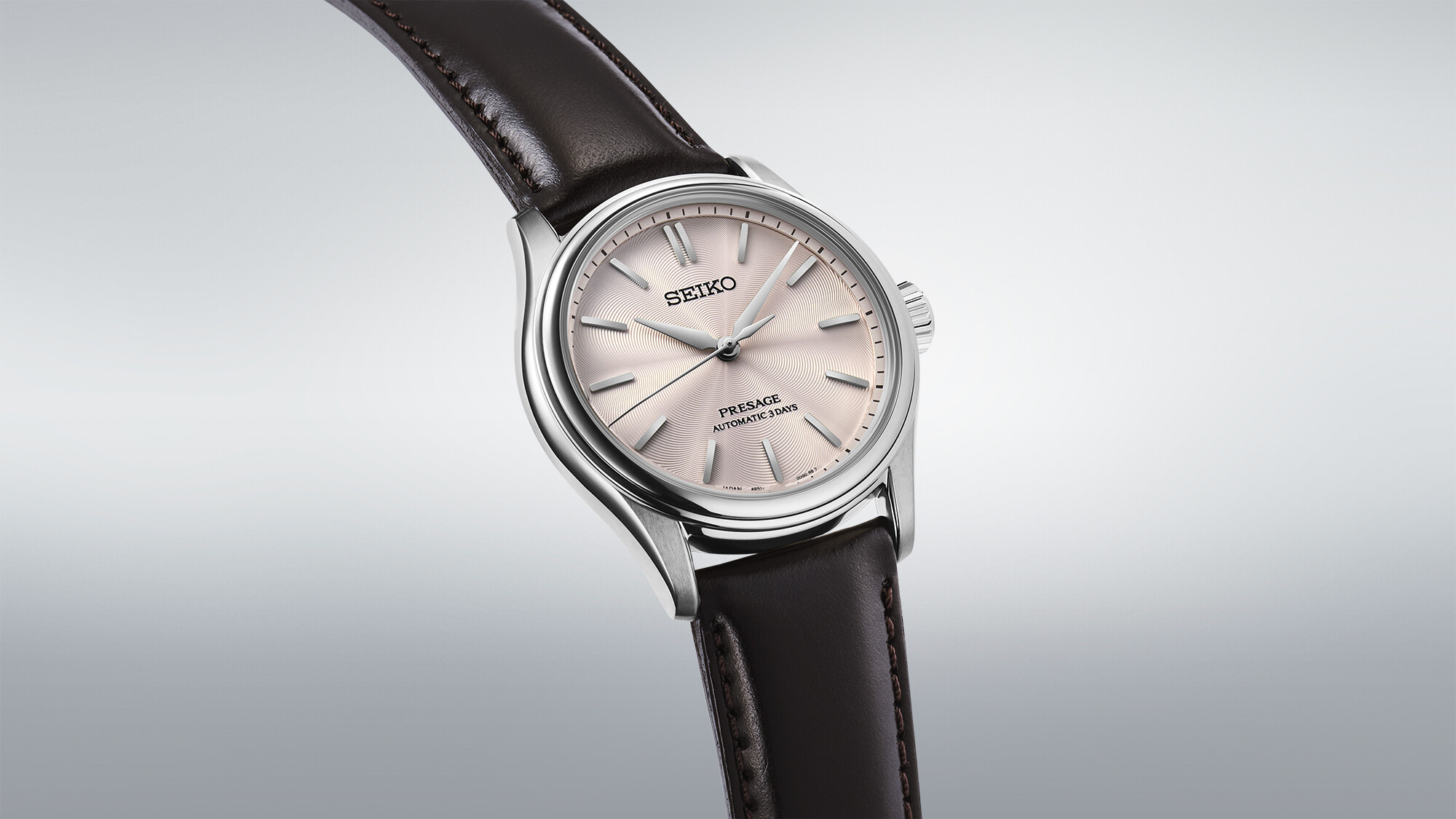 Seiko HCC003J1 Herrenuhr mit rosafarbenem Zifferblatt und braunem Lederband